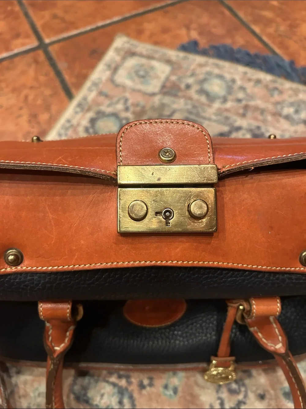 Dooney & Bourke Navy Pebble Leather Satchel with Tan Trim